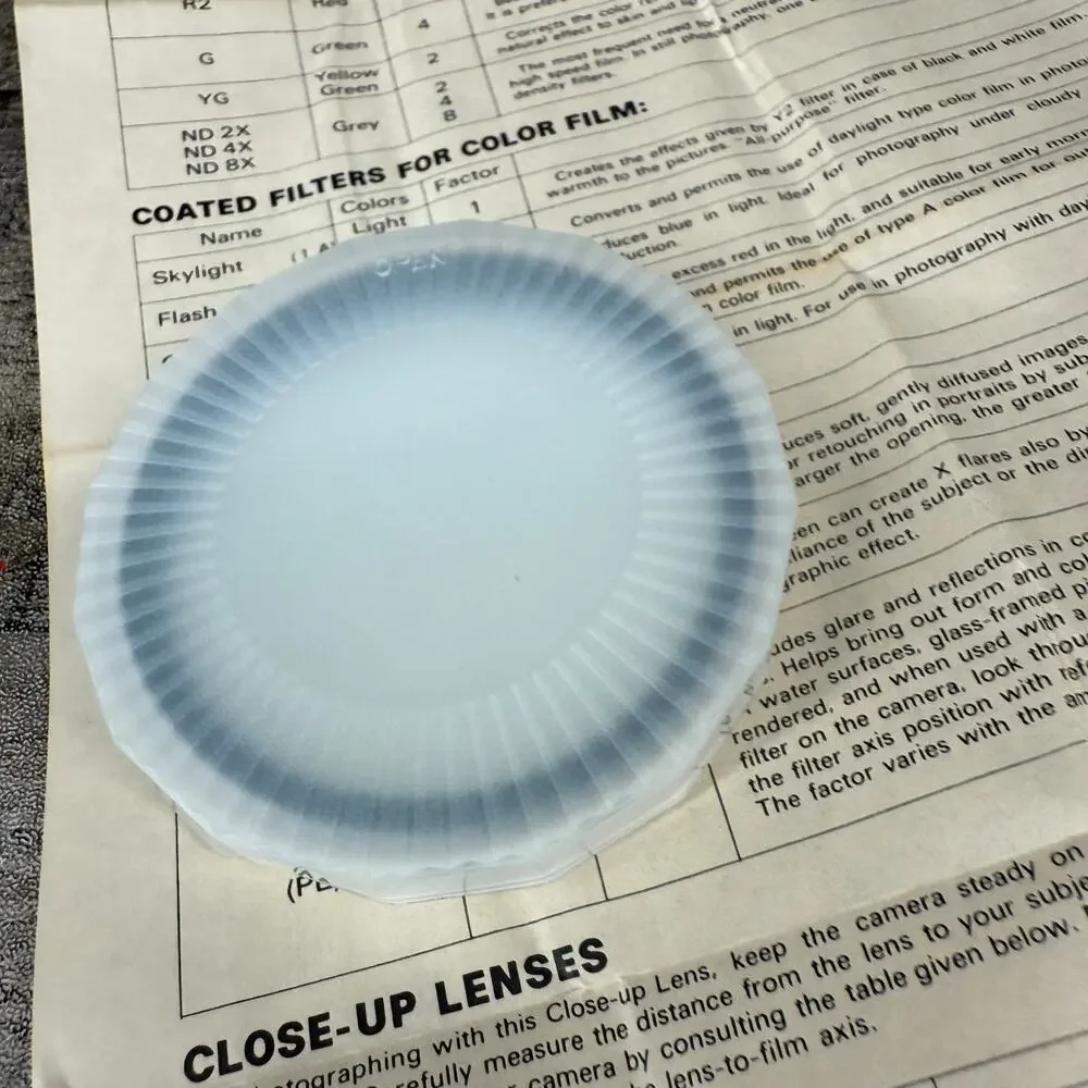 Sakar 52mm Camera Lens Filter Coated UV 58MM W/ Paper Guide